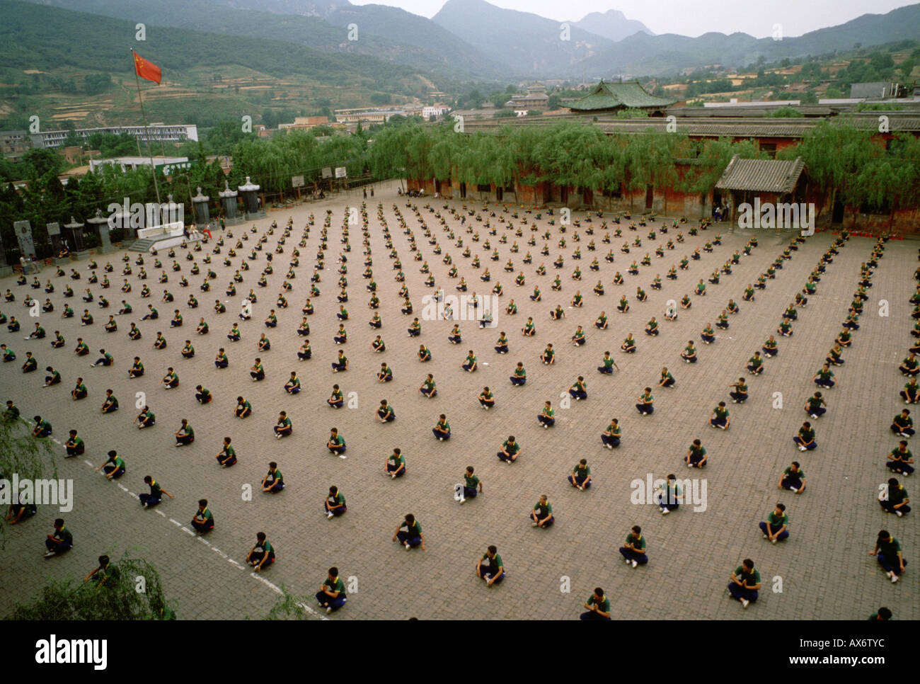 Chinese kung fu students practice synchronized kung fu at the Ta Gou