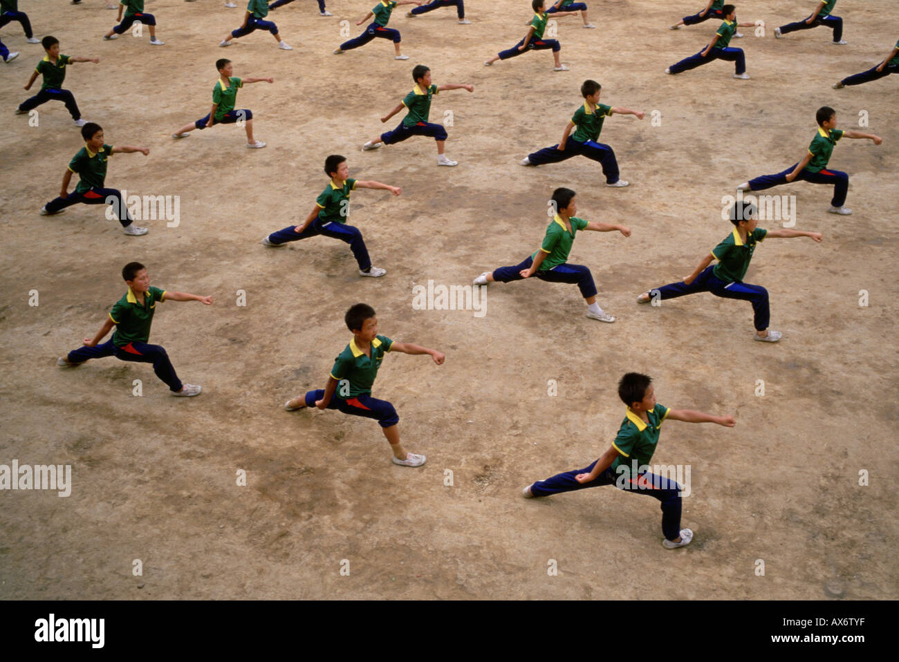 Chinese kung fu students practice synchronized kung fu at the Ta Gou