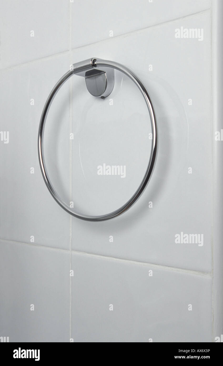 Chrome towel ring mounted onto white ceramic tiles Stock Photo Alamy