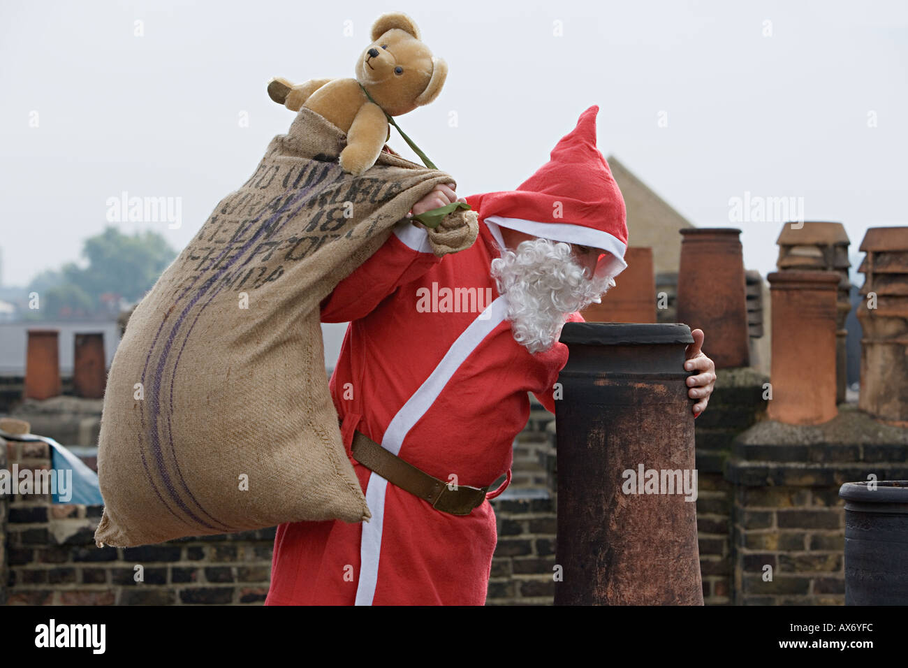 Santa claus delivering gifts hires stock photography and images Alamy