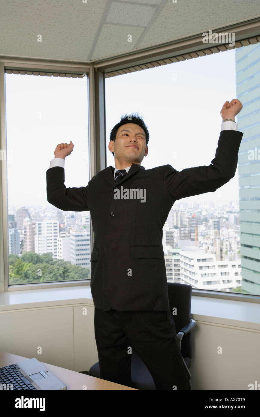Man stretching arms hi-res stock photography and images - Alamy
