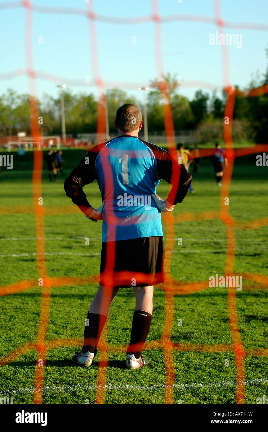 An adult soccer player guards his net Stock Photo Alamy