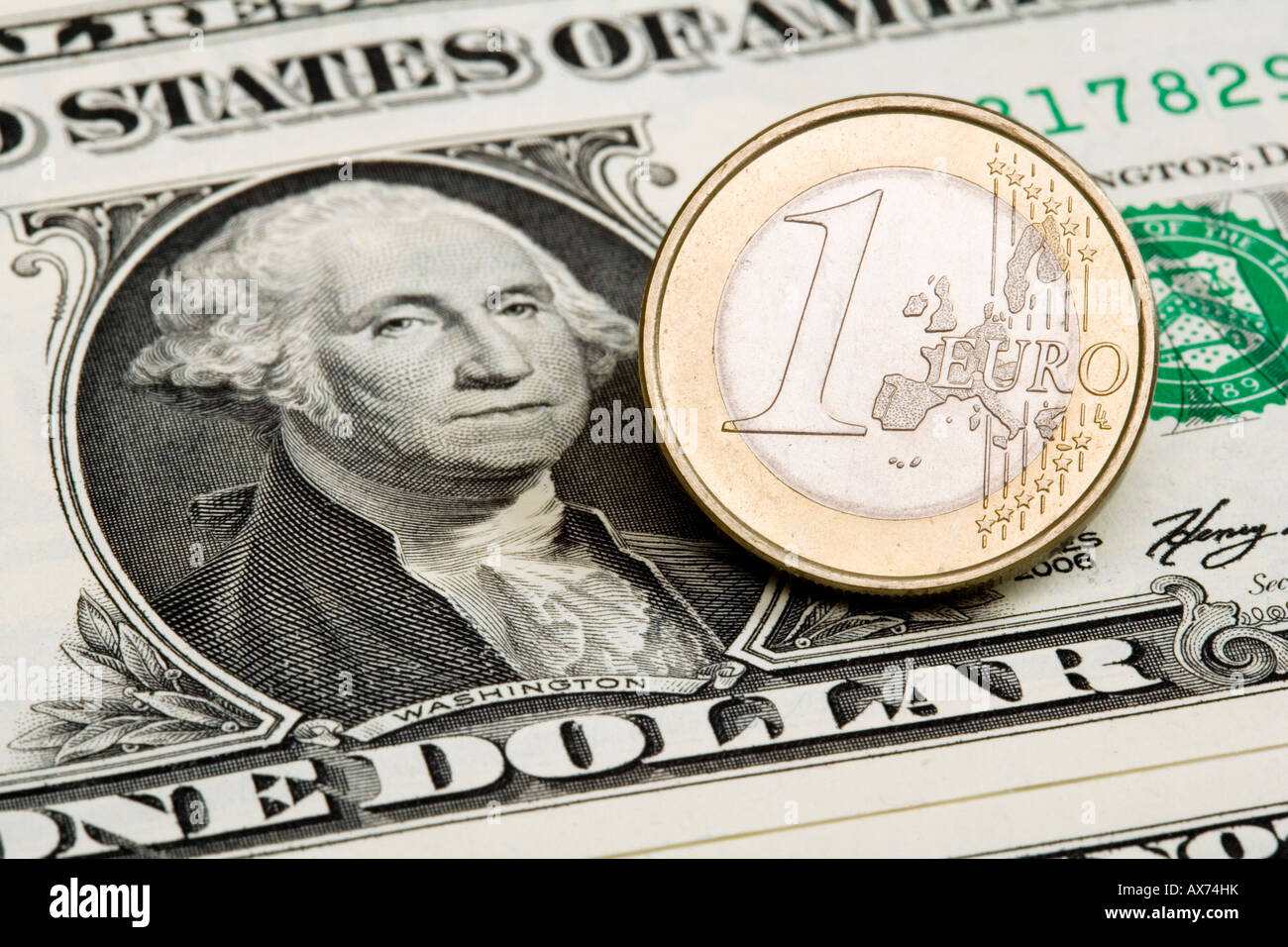 1 US Dollar banknote and 1 Euro coin Stock Photo - Alamy