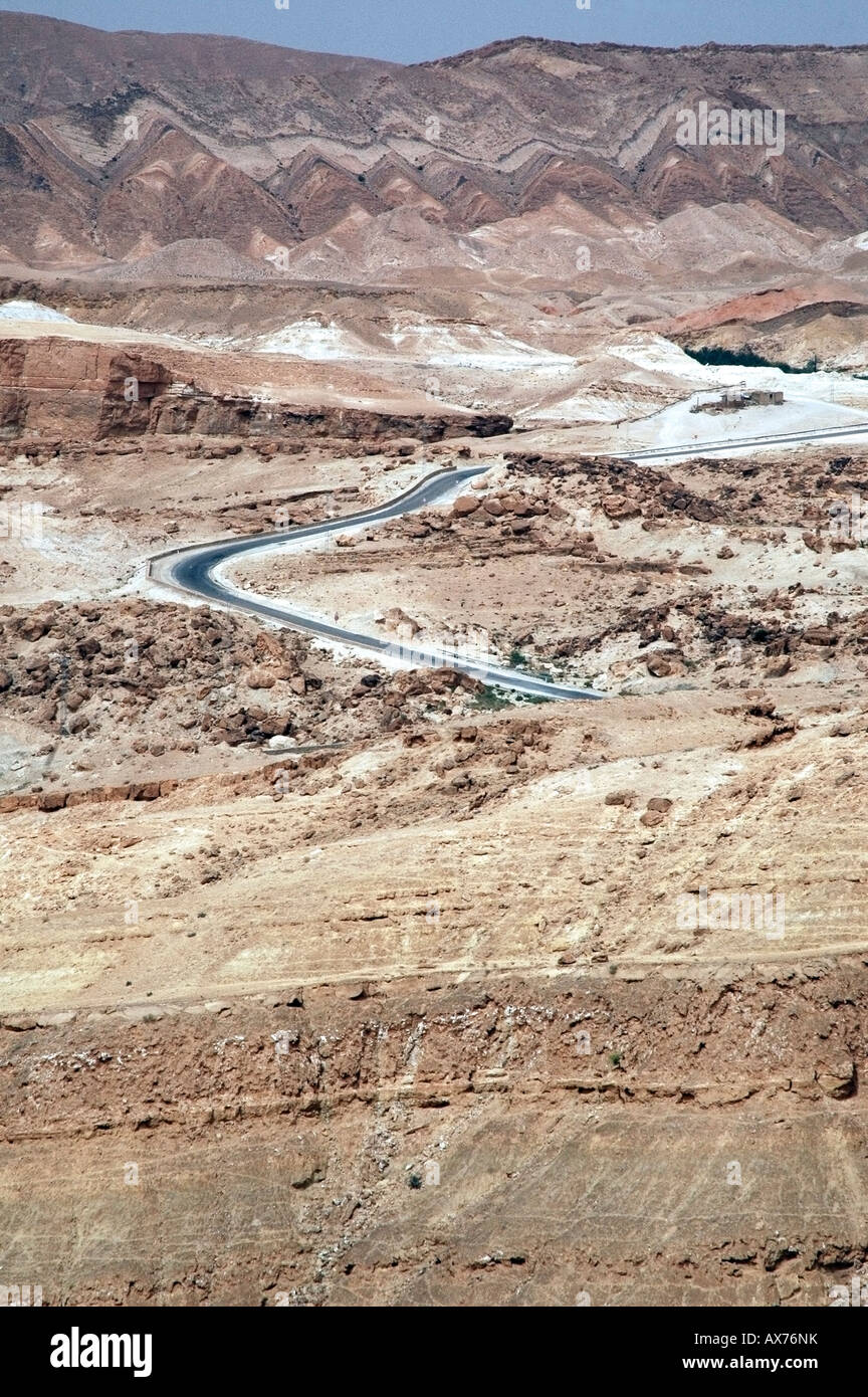 Road cuts through the Aures mountain s close to Chebika, Tunisia. Stock Photo