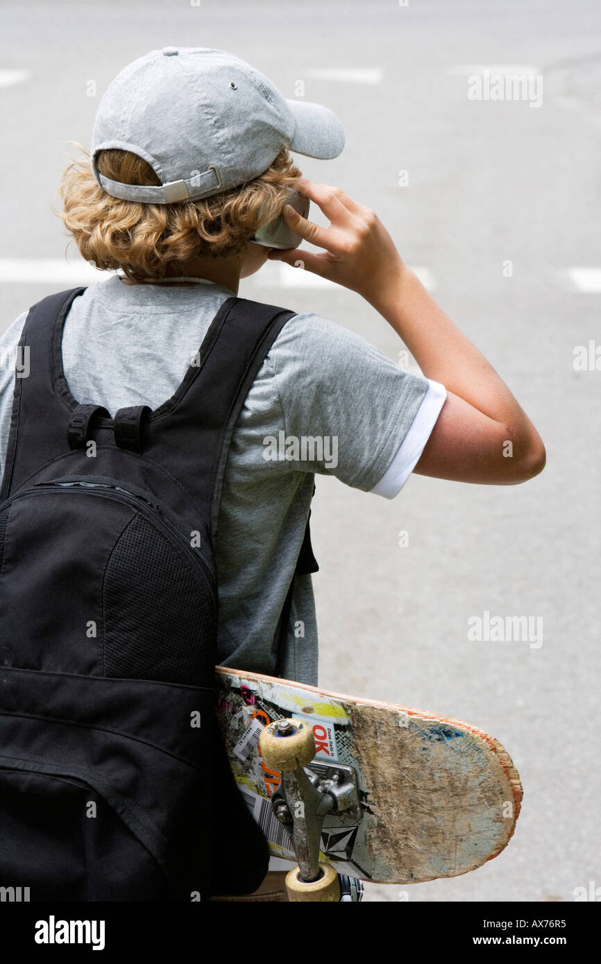 Child using phone rear hi-res stock photography and images - Alamy