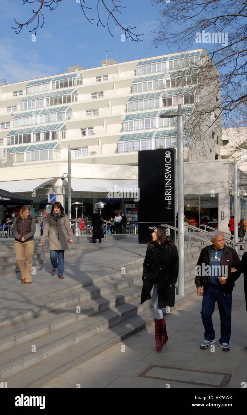 People at south entrance (Bernard Street) to newly redeveloped Brunswick Centre, Bloomsbury, London, England Stock Photo