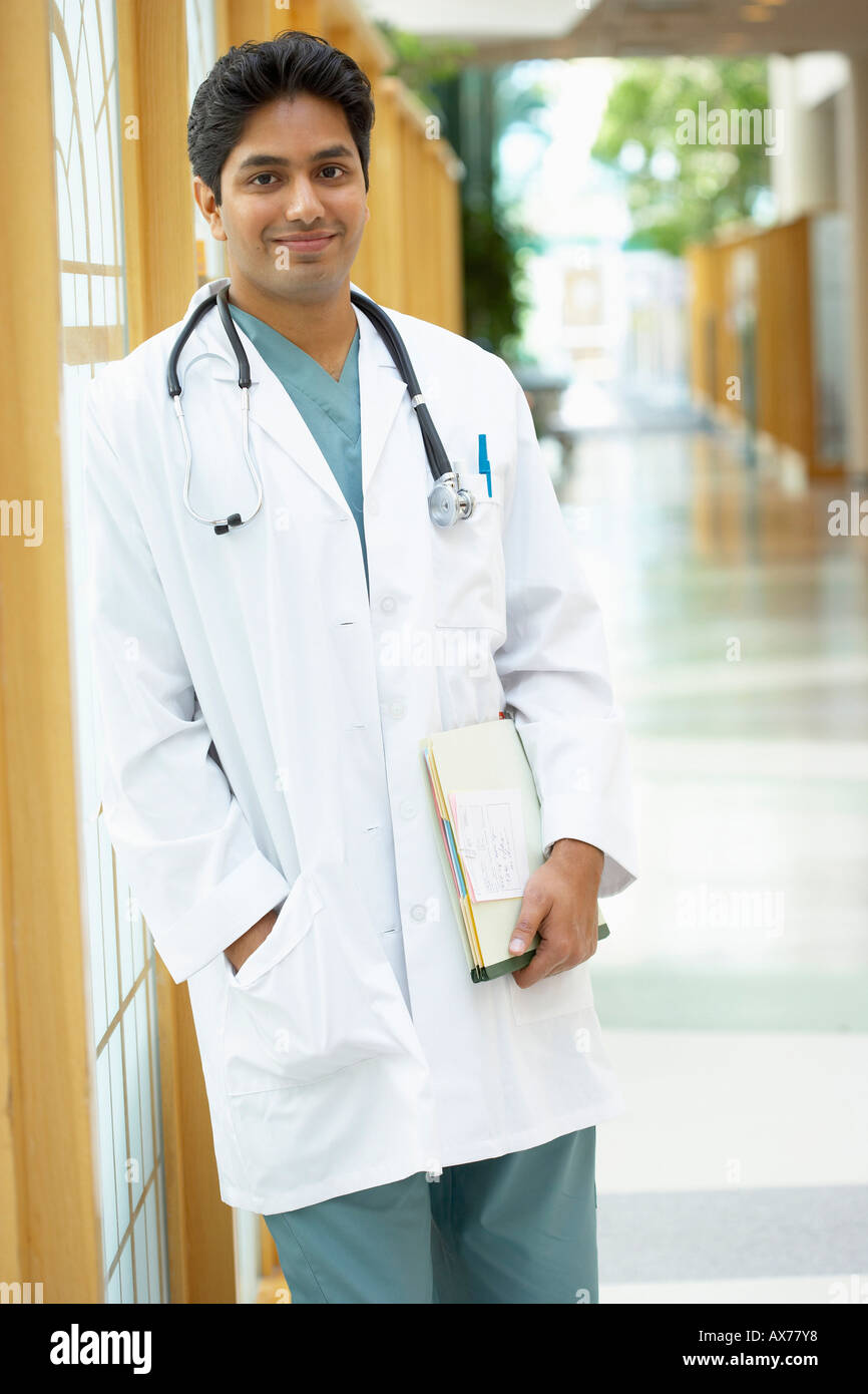 Indian male doctor book hi-res stock photography and images - Alamy