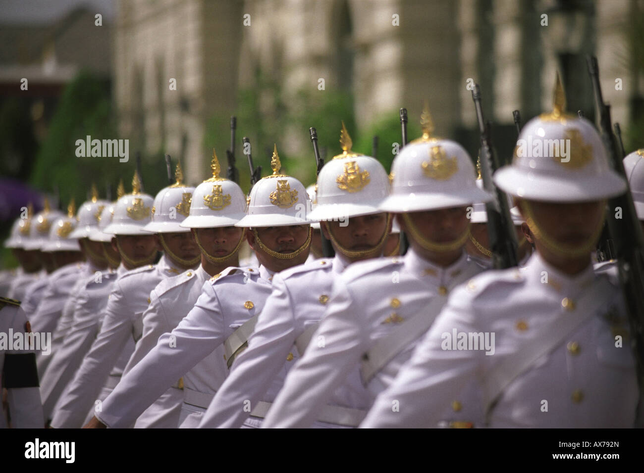 Grand Palace guards at Wat Phra Kaew Grand Palace Bangkok. Performing changing of the guard. Stock Photo