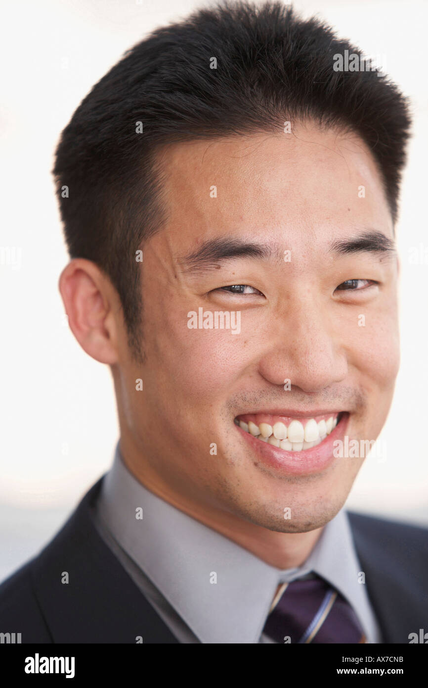 Young black businessman smiling hi-res stock photography and images - Alamy