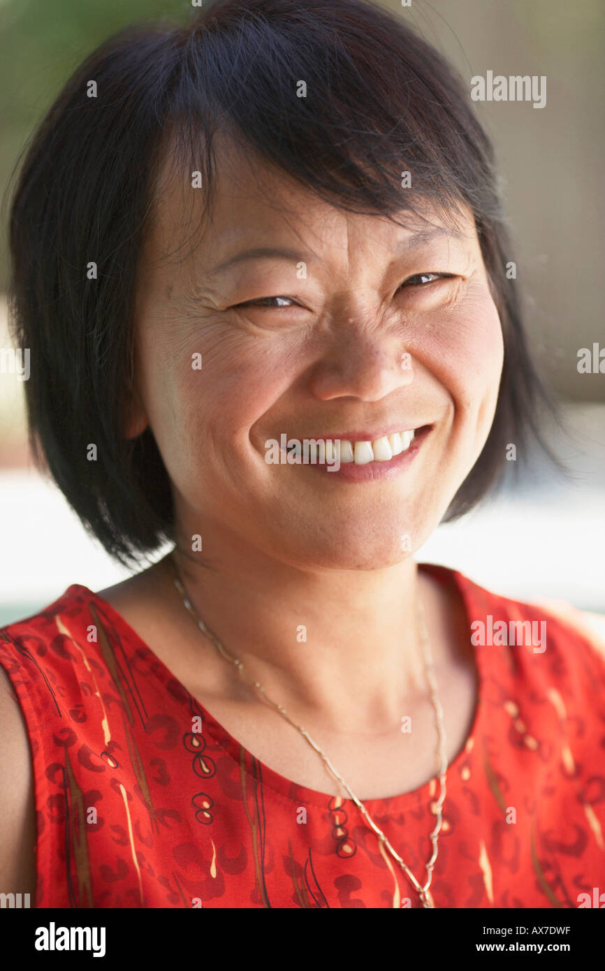 Portrait of a mature woman smiling Stock Photo - Alamy