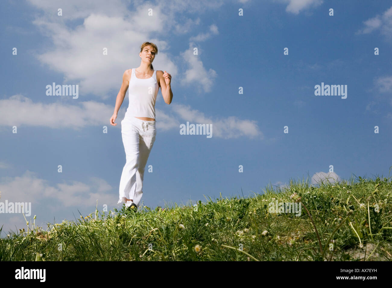 Young woman jogging Stock Photo