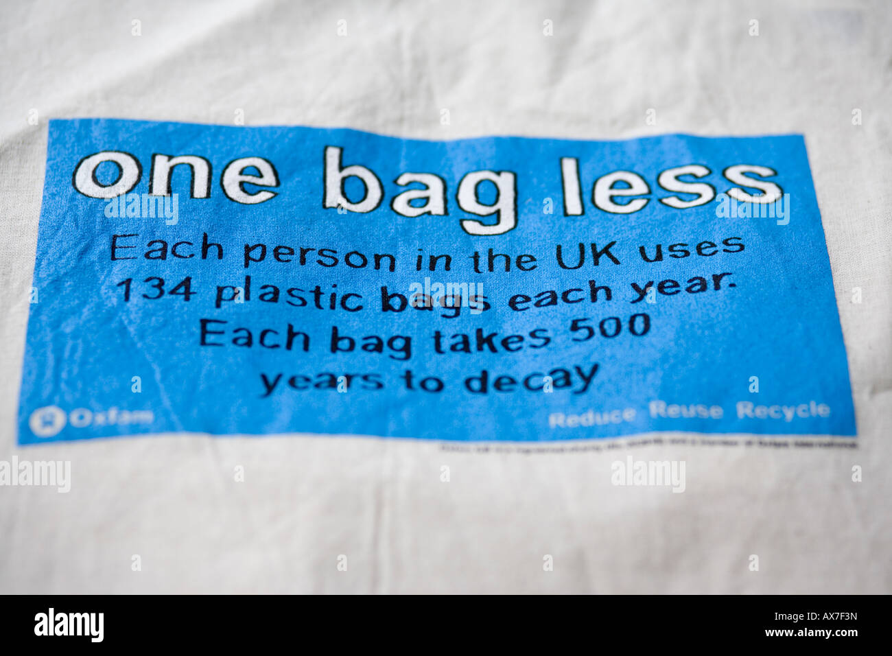 Oxfam One Bag Less Slogan On A Reusable Shopping Bag Uk Stock Photo Alamy