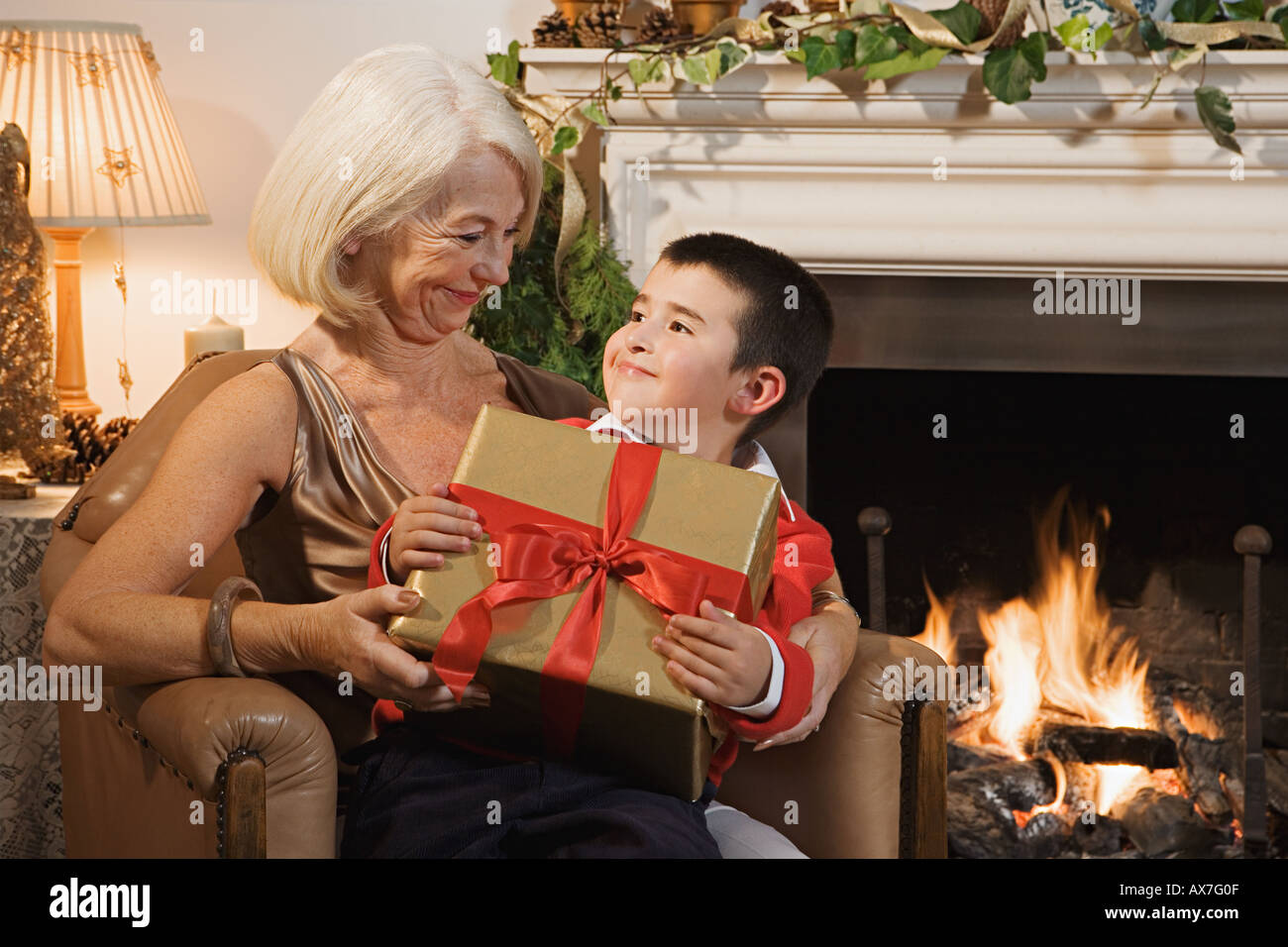 Grandmother and grandson at christmas Stock Photo