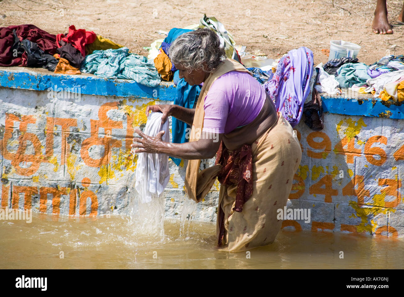 Woman Washing Clothes In A River Tamil Nadu India Stock Photo Alamy Woman Washing Clothes In A River Tamil Nadu India Stock Photo Alamy