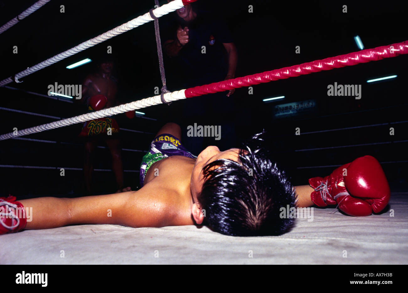 Knocked out Muay Thai fighter. Phuket, Thailand Stock Photo - Alamy