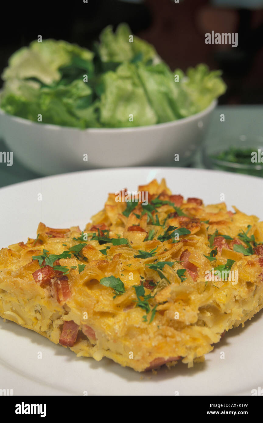 Baked Schinkenfleckerln with salad Stock Photo - Alamy