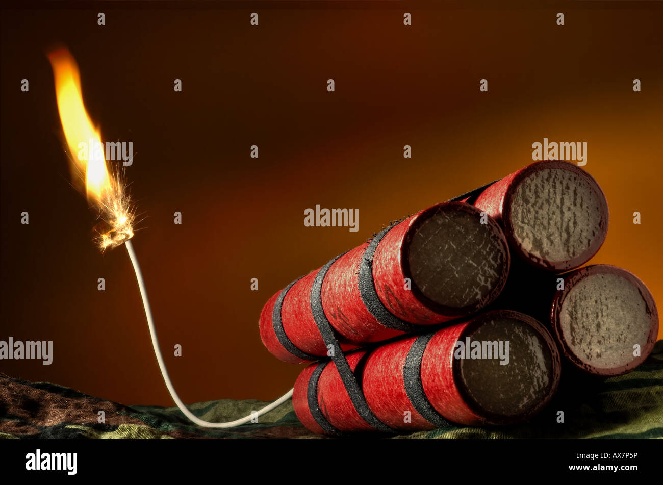 Dynamite sticks with lit fuse Stock Photo