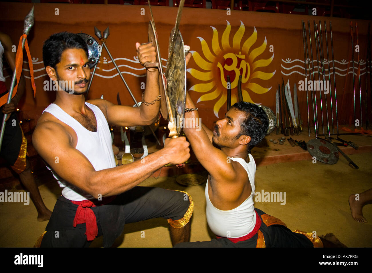 Kalarippayattu martial arts performers fighting, Kerala Kalari Centre