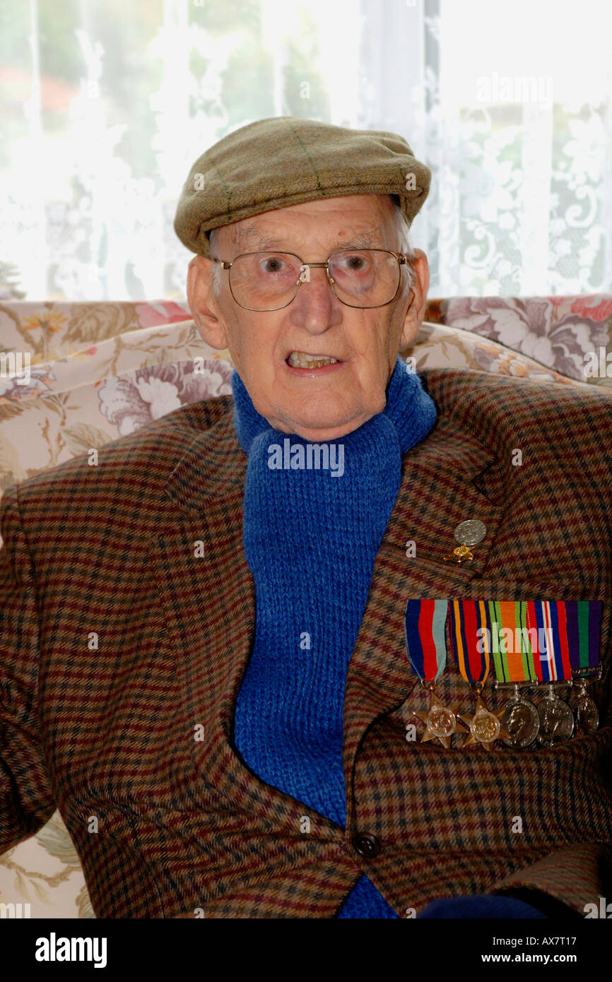 British War Veteran wearing his medals on Remeberance day. Stock Photo