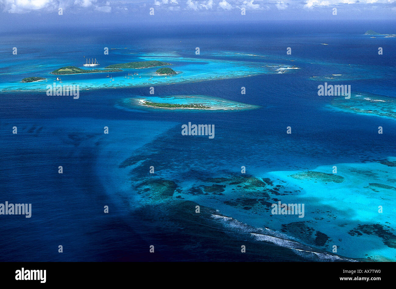 Aerial view of the archipelago Tobago Cays under clouded sky, Grenadines, Caribbean, America Stock Photo