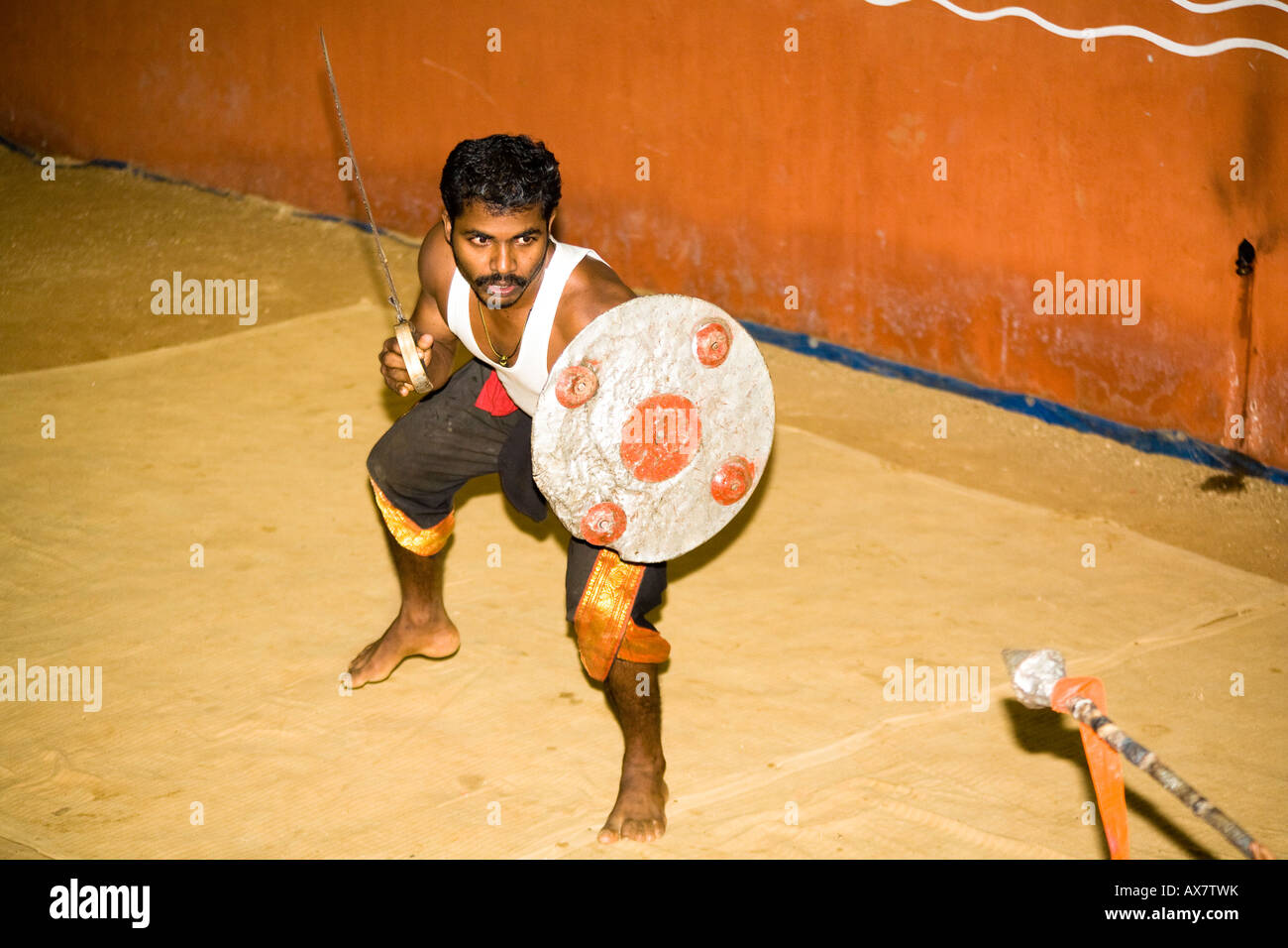Kalarippayattu martial arts performer, during performance, Kerala
