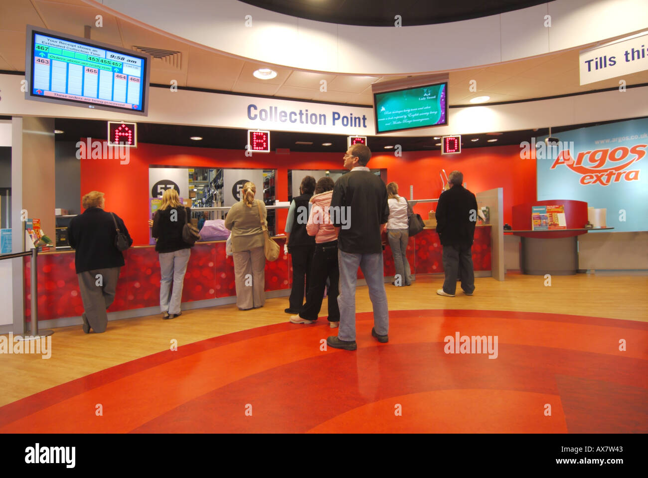 interior-of-argos-extra-catalogue-shopping-store-with-people-waiting-at