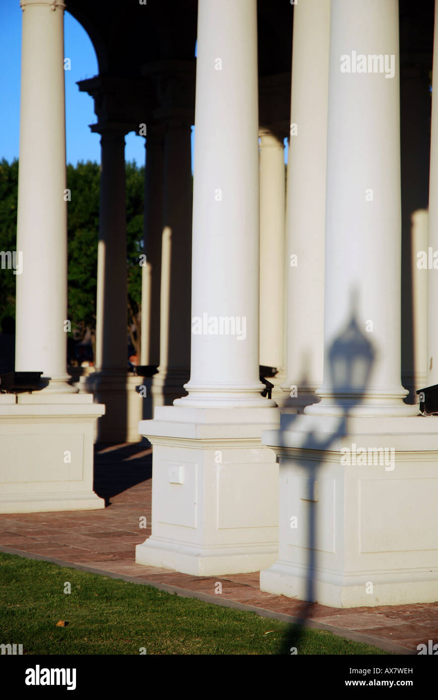 Columns of the Municipal Museum of Fine Art with shadow of street lamp in Tigre, Argentina, South America. Stock Photo