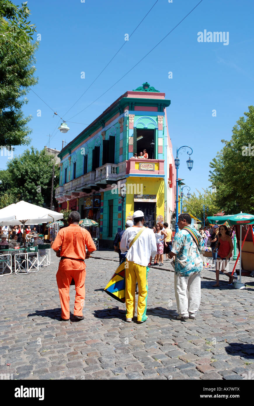 Street performers in the neighborhood of La Boca in Buenos Aires, Argentina. Stock Photo