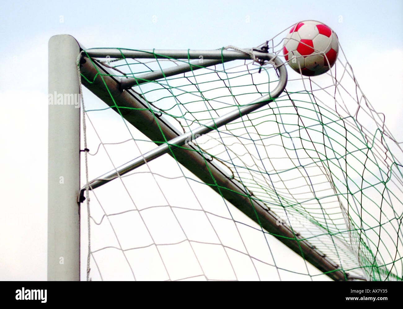 Football in the goal Fußball im Typical Stock Photo Alamy