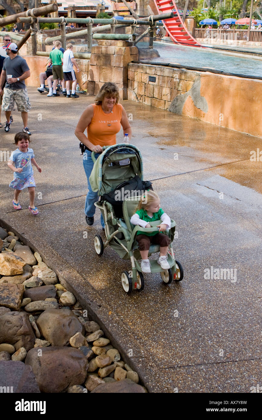 Mother and Baby in Stroller at Busch Gardens Tampa Florida USA Stock