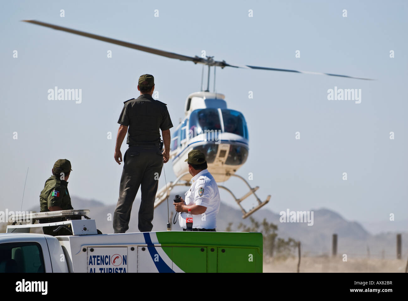 Green Angels, assistants to tourists in Mexico, watching chase
