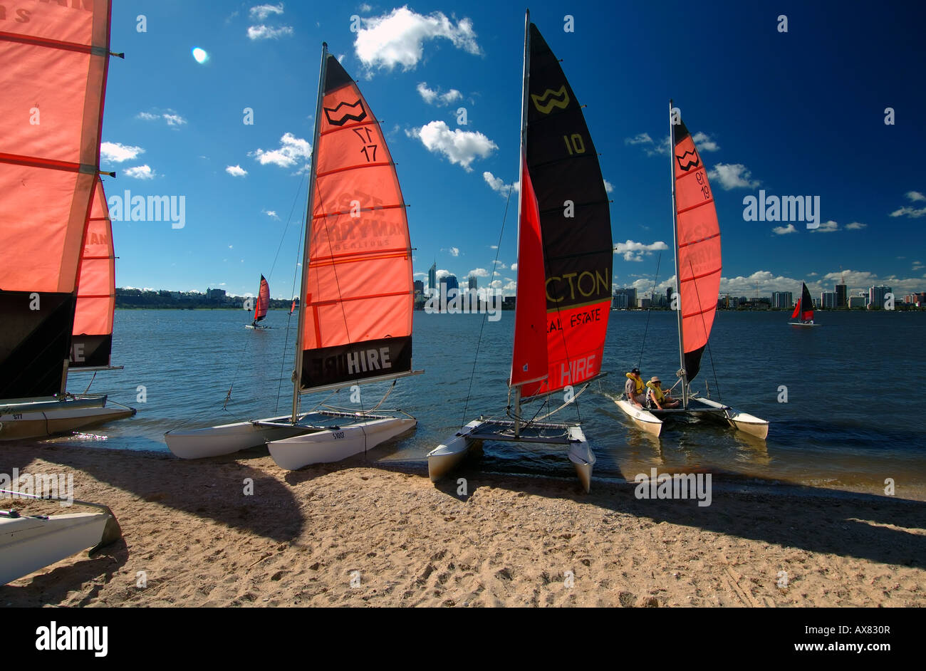 Sailing catamarans for hire on the shores of the Swan River Perth