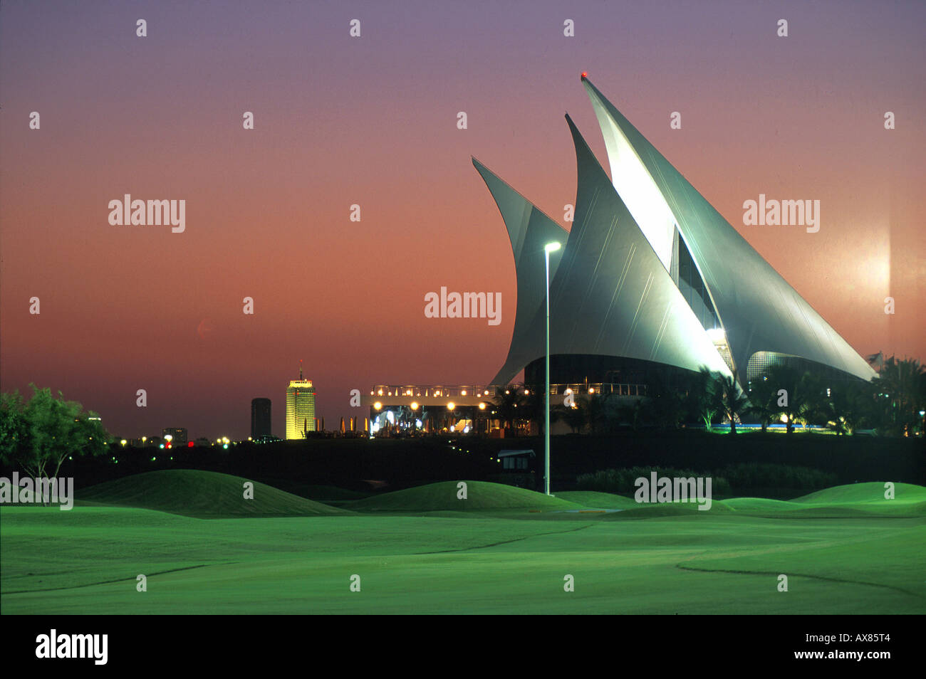 The Illuminated Clubhouse Of The Dubai Creek Golf Club In The Evening 