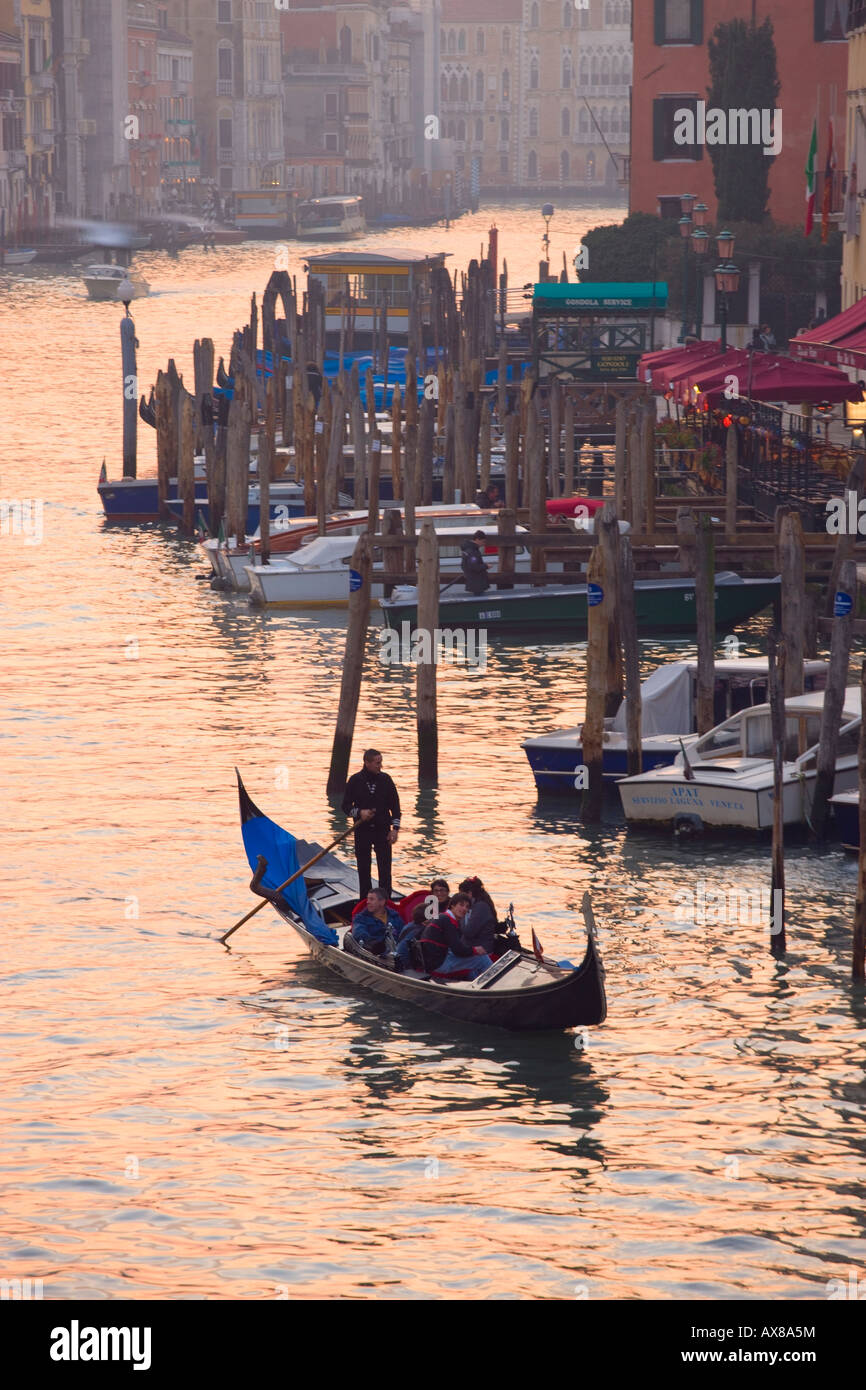 Gondola on the Grand Canal Venice Italy at dusk Stock Photo