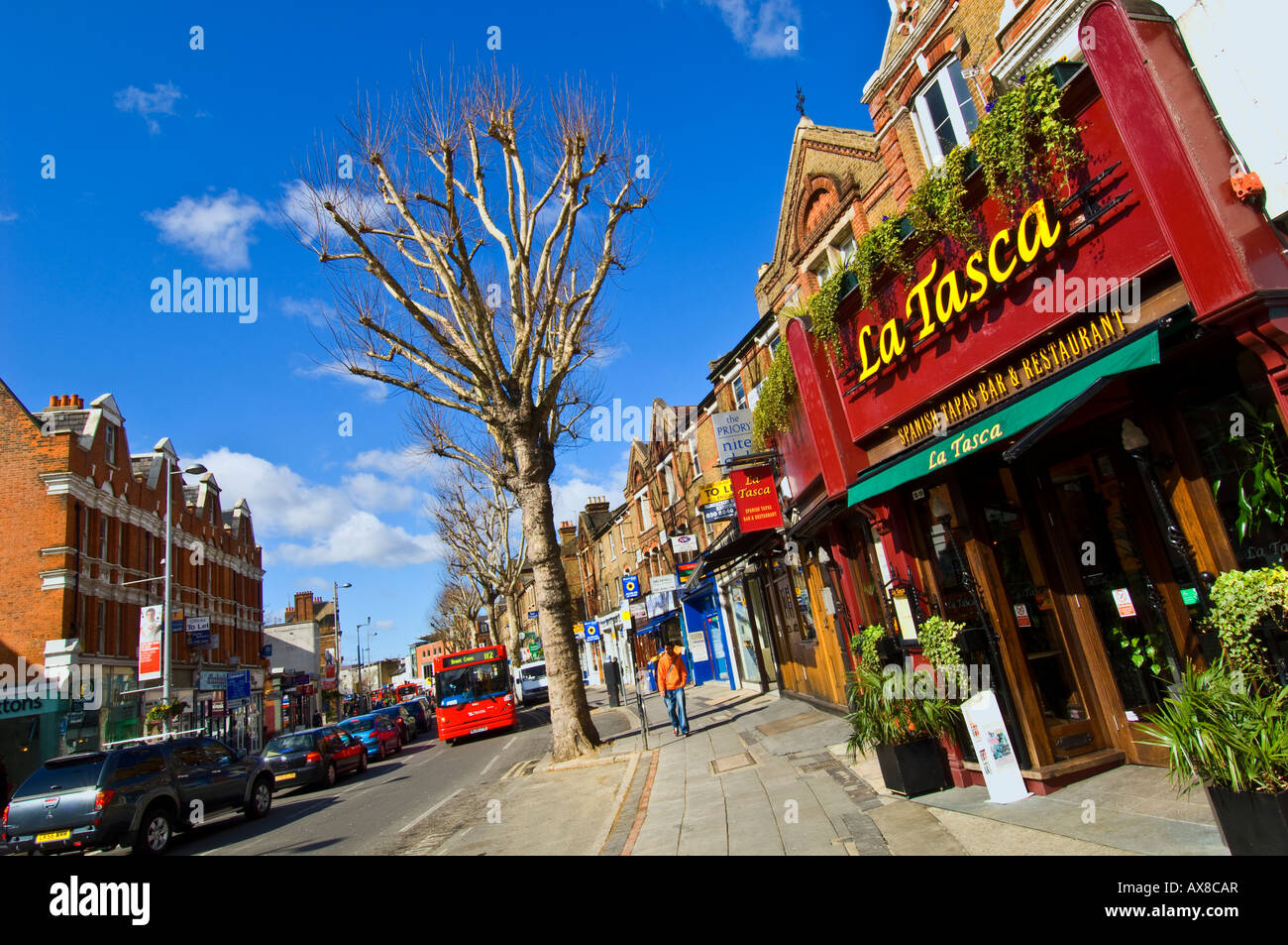Shops and car traffic on Uxbridge Road Ealing Broadway W5 London United