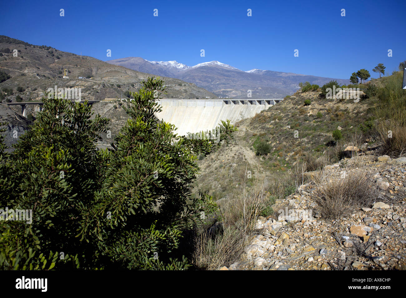 The Rules dam or Presa de Rules across the river Rio Guadalfeo near Velez de Benaudalla, Las Alpujarras, Granada Province, Spain Stock Photo