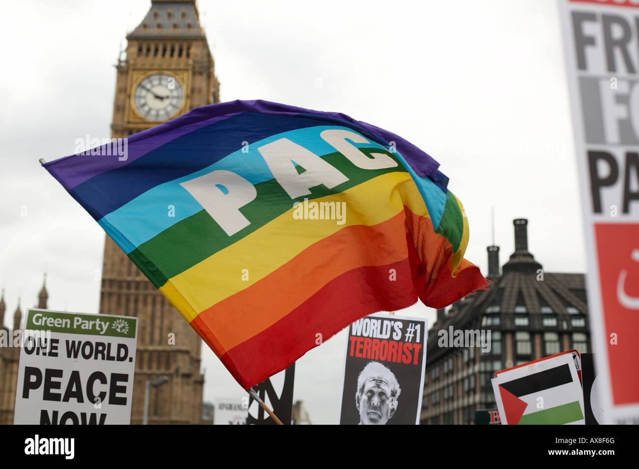 PEACE flag waving at an Anti War rally in London UK Stock Photo