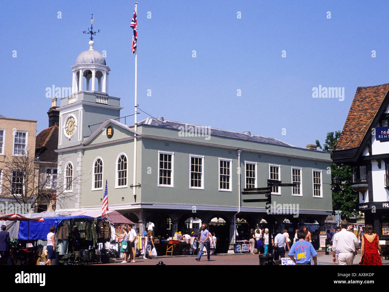 Faversham Guildhall Market day stalls Kent people buying shopping