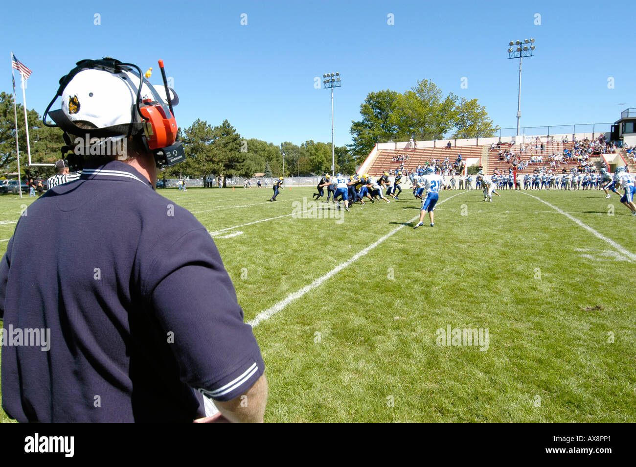American High School Football Action coach wearing headphones Stock Photo Alamy