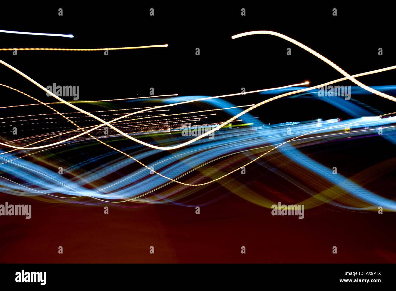 A streak of colourful night lights Stock Photo Alamy