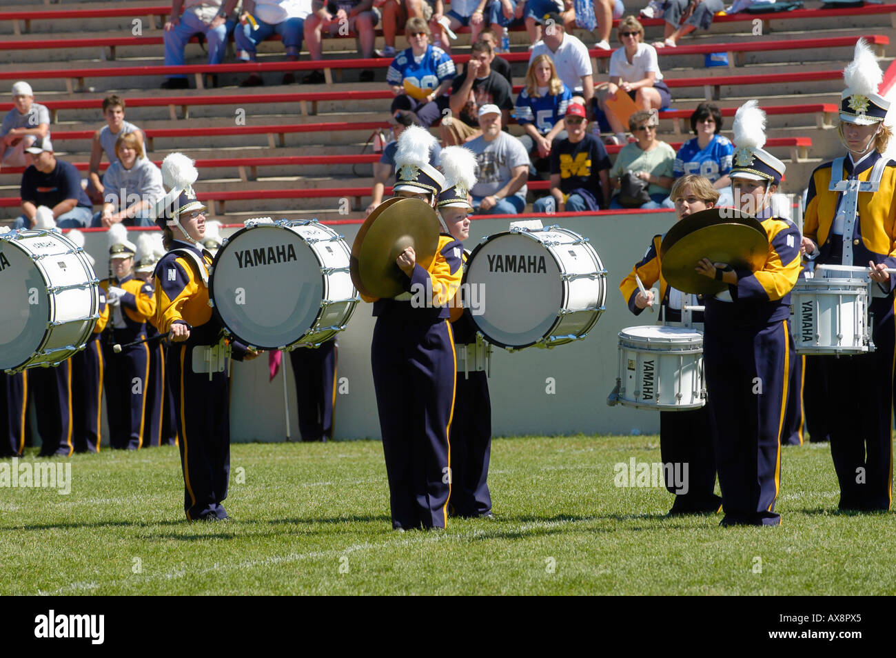 American High School Marching Band performs during the halftime of a