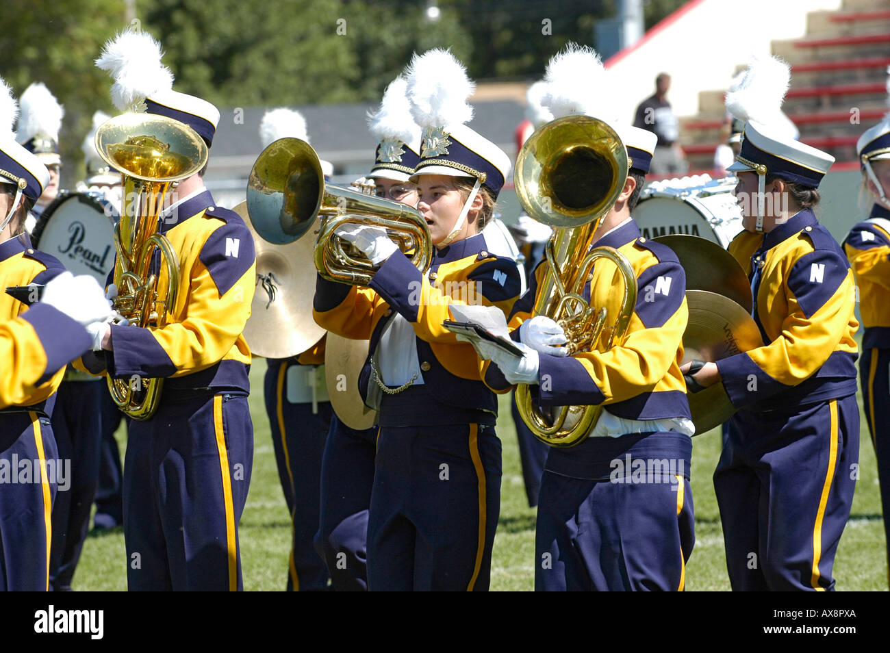 American High School Marching Band performs during the halftime of a