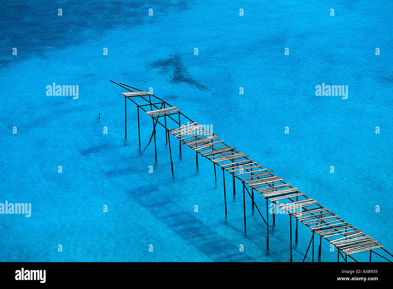 Broken wooden jetty near Porticello, Lipari Island, Aeolian Islands, Italy Stock Photo