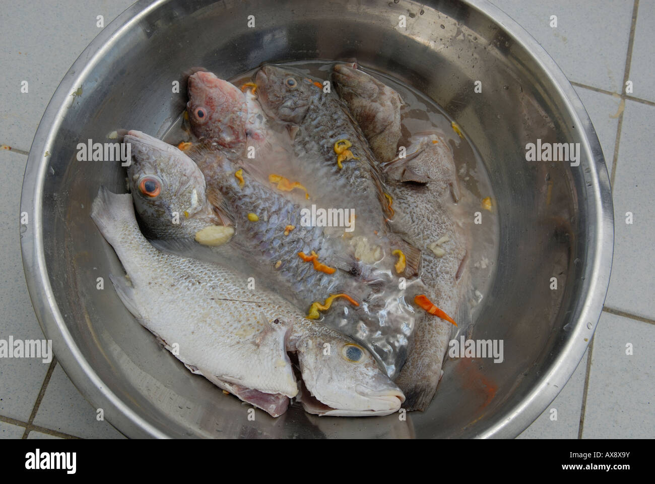 marinated fish with hot peppers, creole cuisine Stock Photo