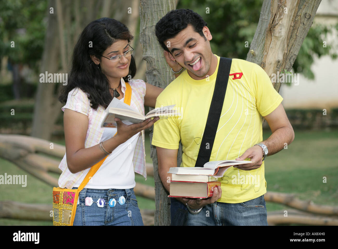 College student studying in a park Stock Photo - Alamy
