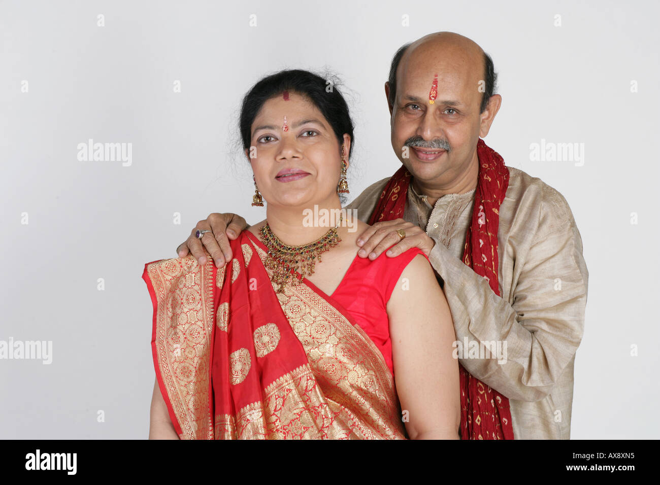 Indian couple in traditional clothing hi-res stock photography and ...