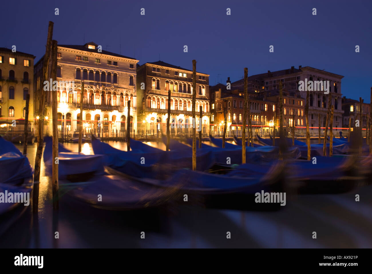 Gondolas on Grand Canal Venice Italy at twilight Stock Photo