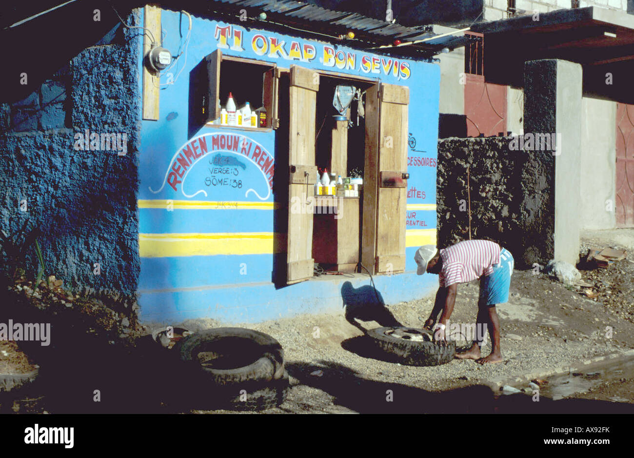 Caption HAITI TYRE SERVICE JACMEL Photo Julio Etchart Stock Photo