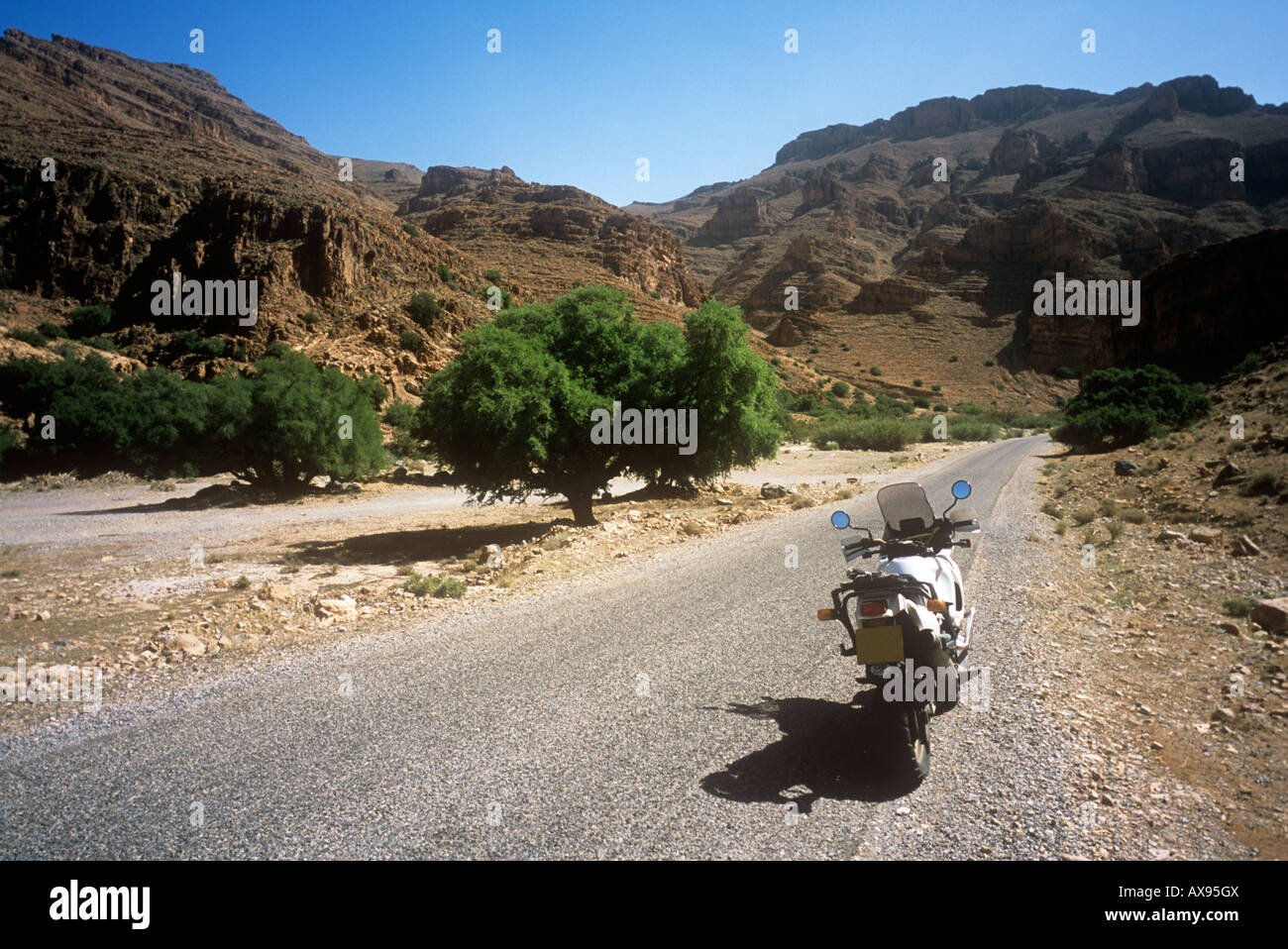 motorbiking down Ait Mansour Gorges, in the Anti Atlas mountains, near Tafraoute, Southern Morocco Stock Photo