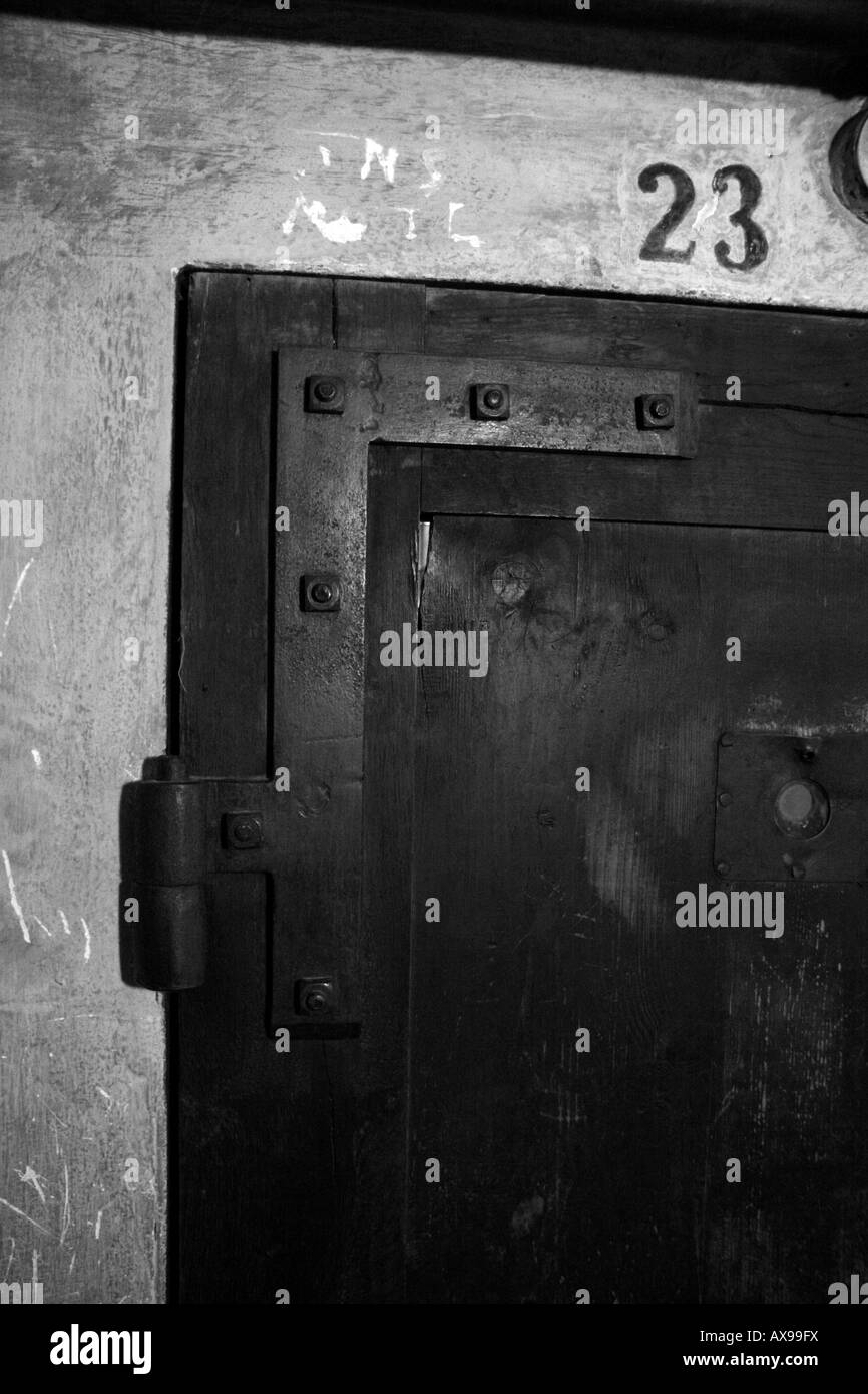 A door jam to an underground prison cell in Block 11, Auschwitz-Birkenau Museum, Oswiecim, Poland. ISO1600 Stock Photo